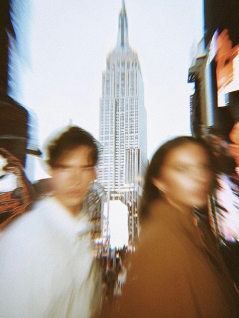 A motion-blurred street scene in New York City